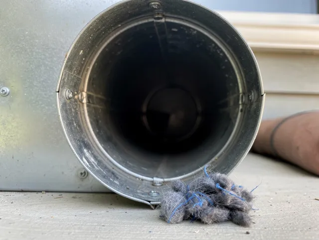 West Whittier-Los Nietos Dryer Vent Cleaning technician using specialized equipment to clear severe dryer vent blockage in West Whittier-Los Nietos